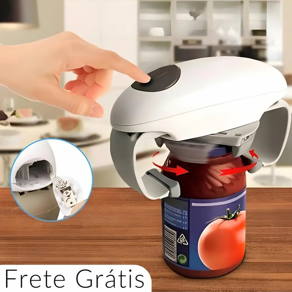 A imagem mostra uma mão prestes a pressionar o botão de um abridor de potes automático colocado sobre um pote de vidro com molho de tomate. Setas vermelhas indicam o movimento das garras do dispositivo abrindo o pote. Um detalhe circular destaca a parte interna do dispositivo. Na parte inferior, o texto "Frete Grátis" está presente.